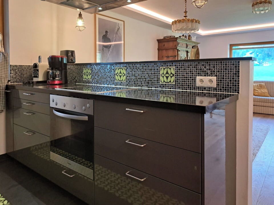 Kitchen, Countertop, Cabinetry, Interior Design, Flooring, Kitchen Appliance, Furniture, Major Appliance, Lighting, Floor