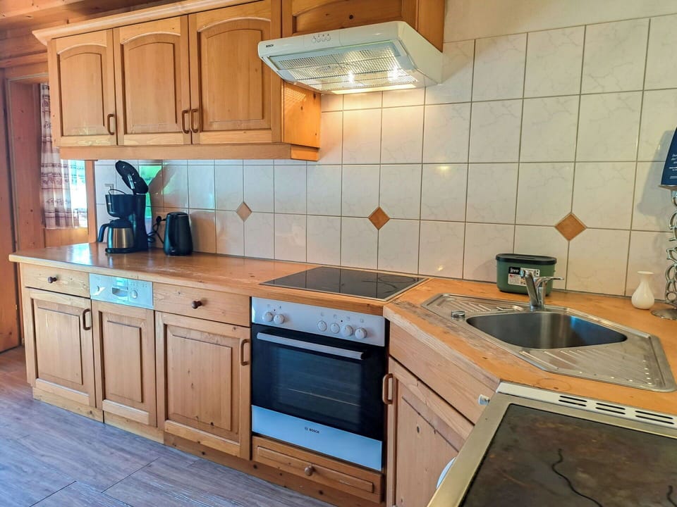 Kitchen, Cabinetry, Countertop, Kitchen Appliance, Flooring, Major Appliance, Wood, Interior Design, Furniture, Floor