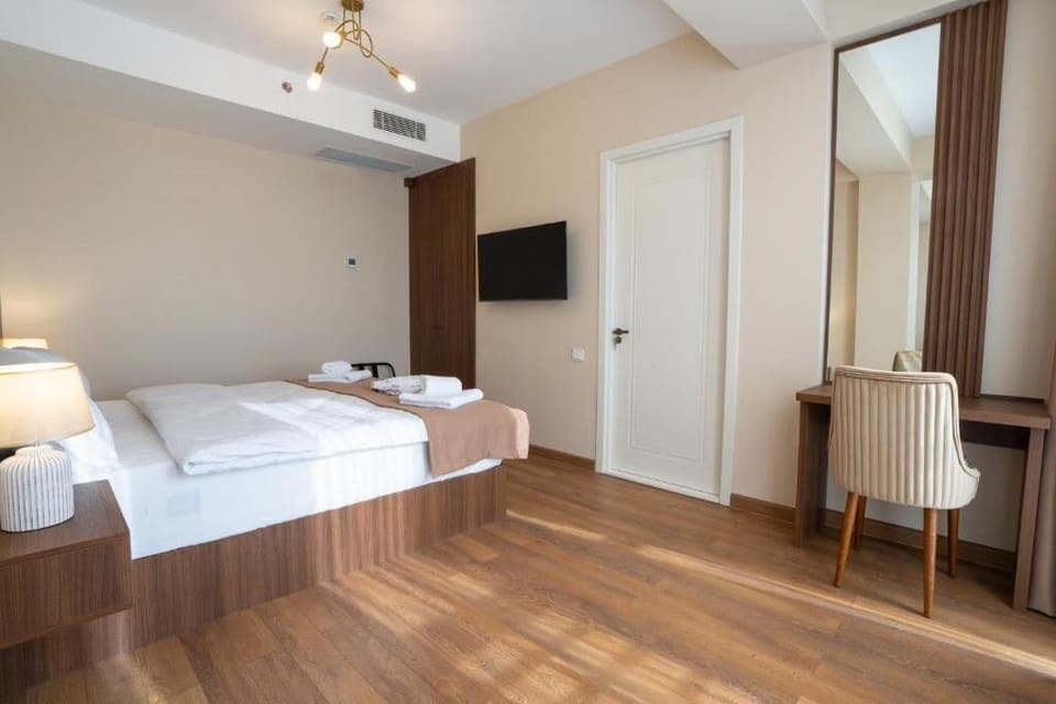 Family Quadruple Room, City View | In-room safe, soundproofing, iron/ironing board, WiFi (free)