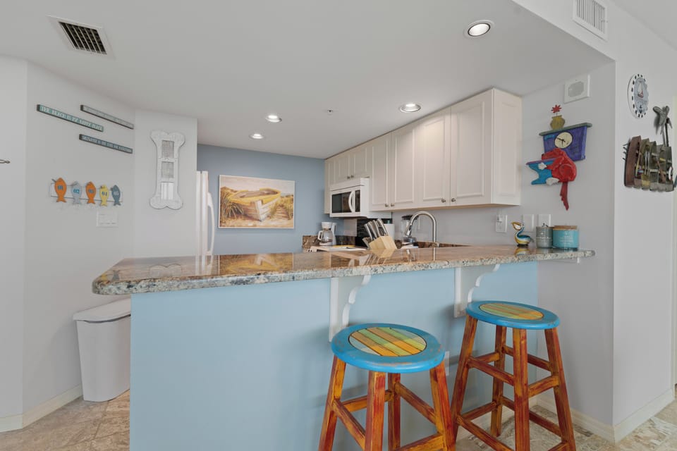 Bar stool setup to eat your snacks at.