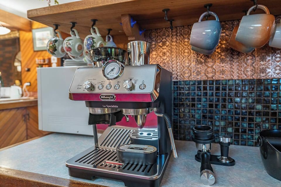 Brew café-style coffee from the coffee machine before settling into the sunroom or heading out for a waterfront stroll.