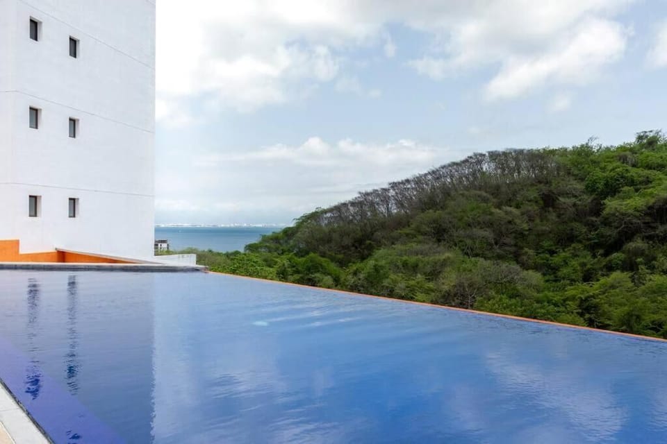 Apartment, Balcony, Mountain View | Pool | 4 outdoor pools