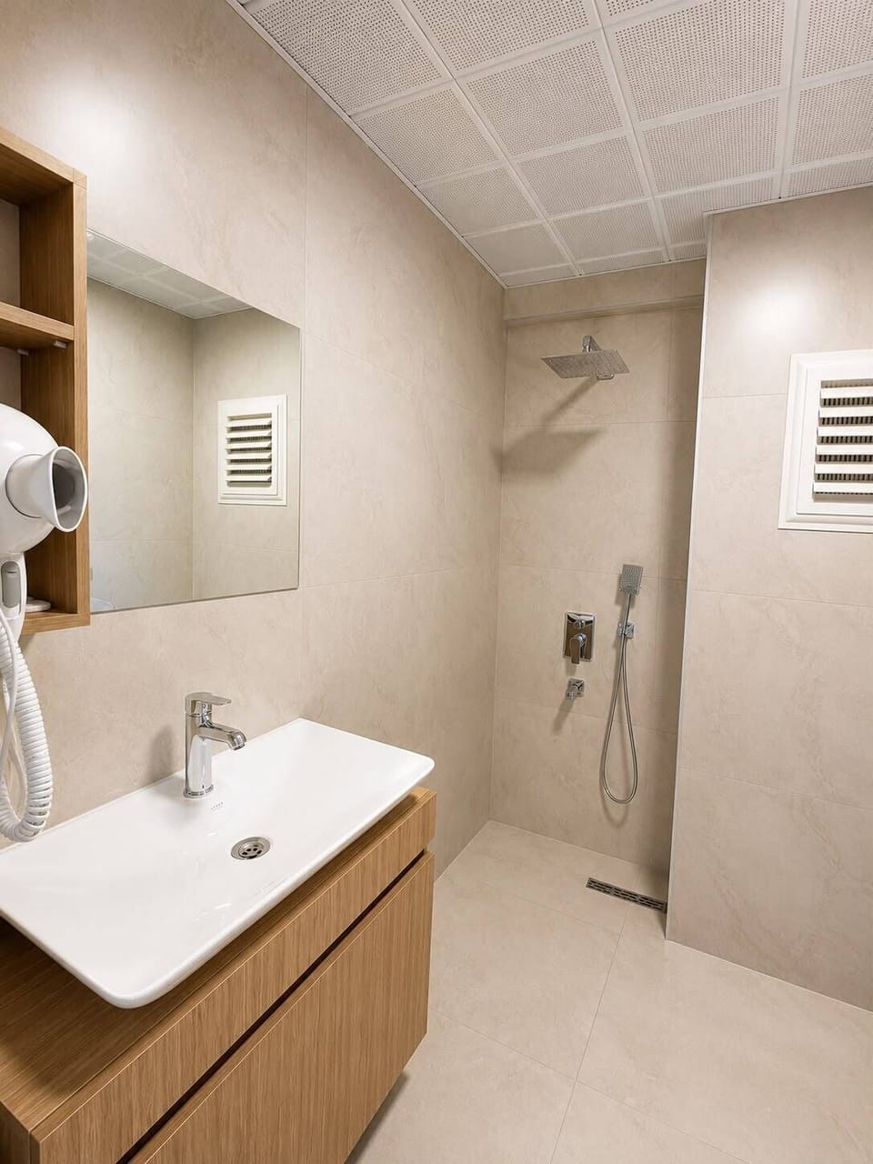 Shower, hair dryer, towels, soap