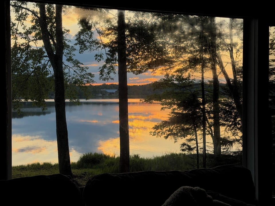 Watch the sunset paint the lake while relaxing in the comfort of the living room
