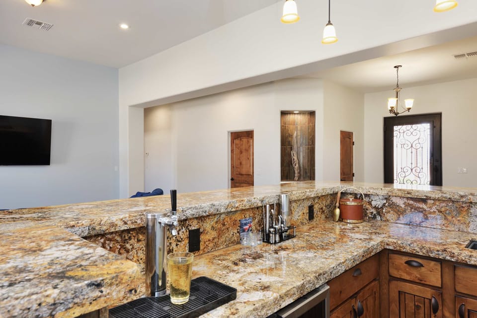 The full custom bar in the living room of the Rockcastle House. 