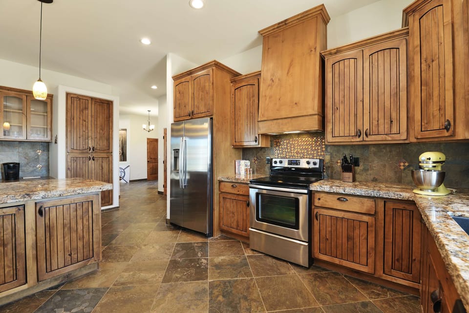 The spacious kitchen has everything you need to prep a home-cooked meal. 