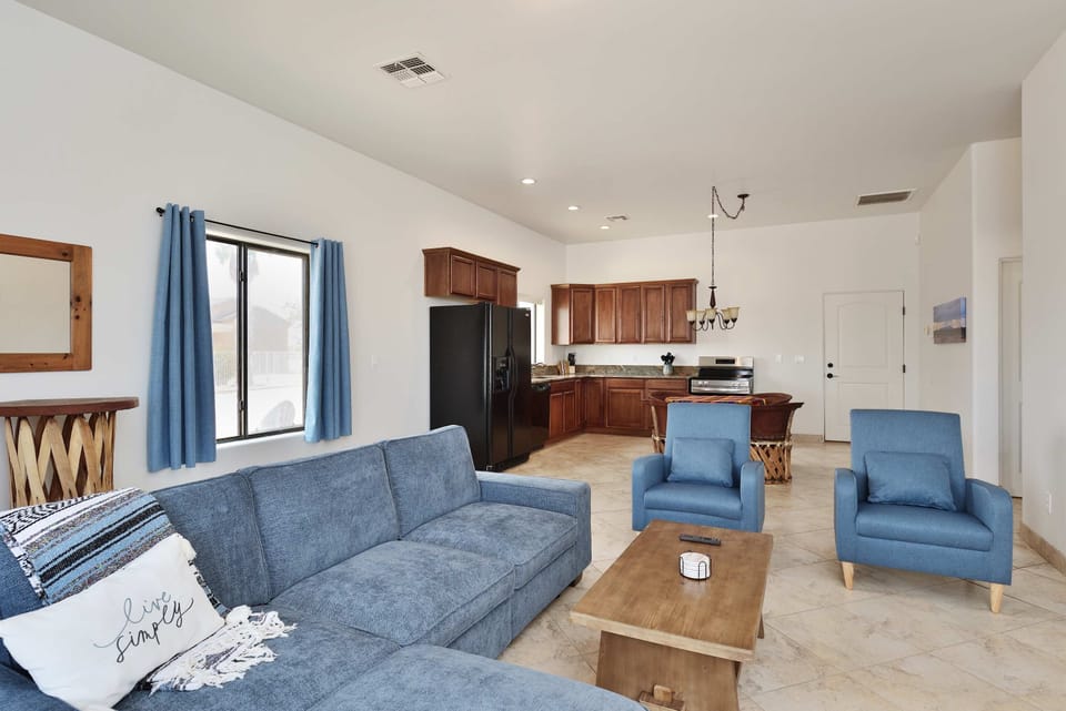 The great room at Dave's Place offers plenty of seating as well as a sofa that converts into a bed. 