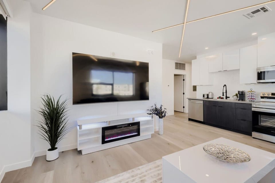 85` TV and Fireplace