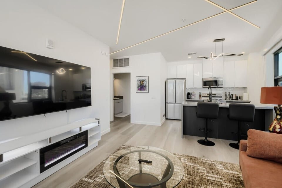 75` TV and Fireplace