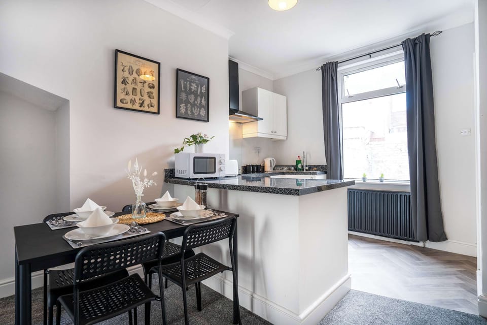 Cook, dine or catch up on emails in the open plan living space with everything you need for a comfortable stay.