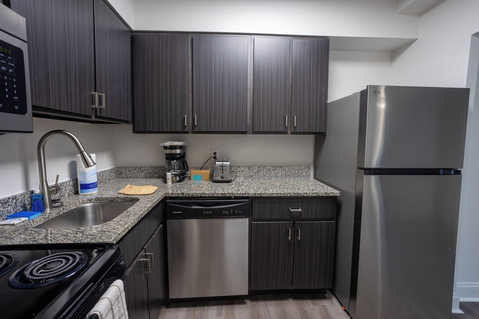 Modern kitchen with stainless appliances and ample counter space