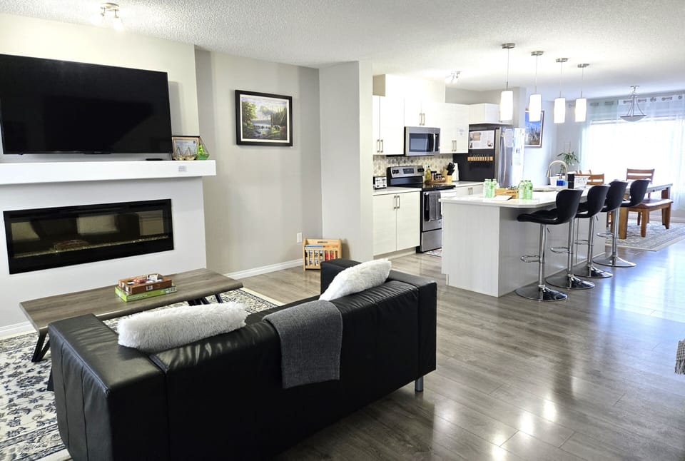 The Living Room, as you come through front door and looking towards the kitchen.
