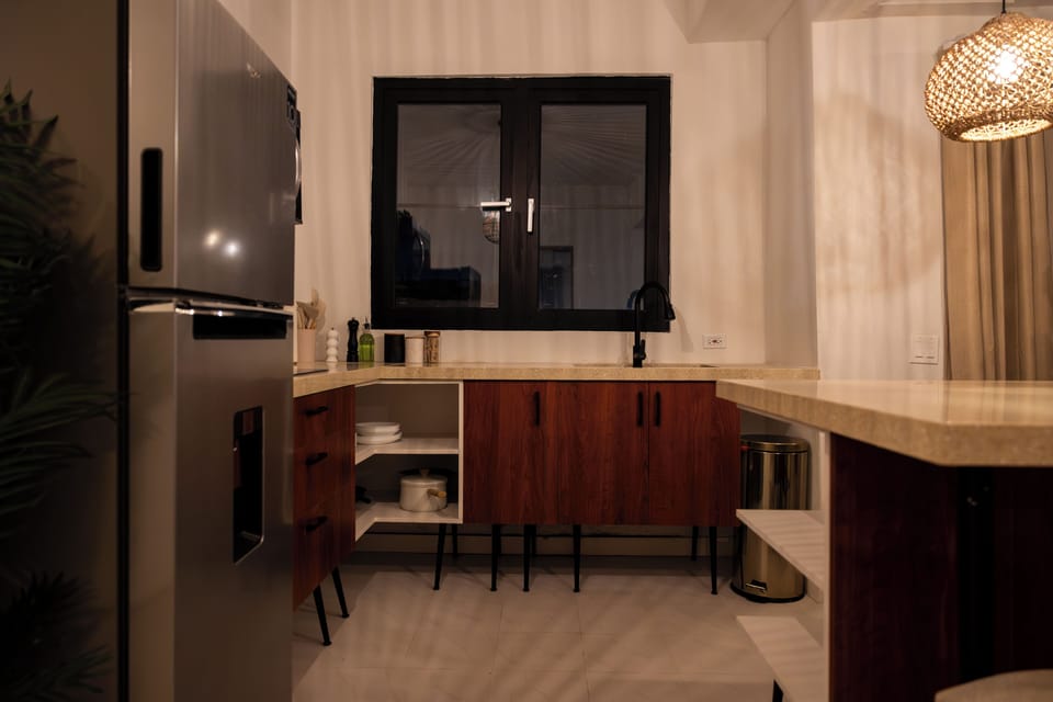 Superior Apartment, Pool View | Private kitchen | Fridge, microwave, stovetop, dishwasher