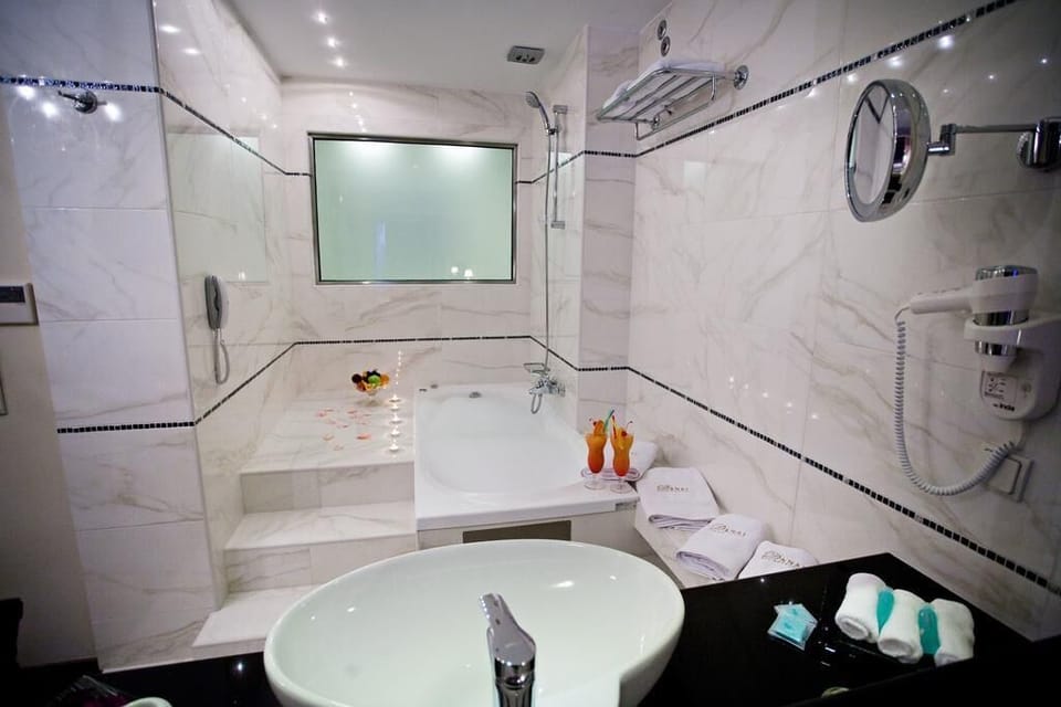 Hair dryer, slippers, towels, soap
