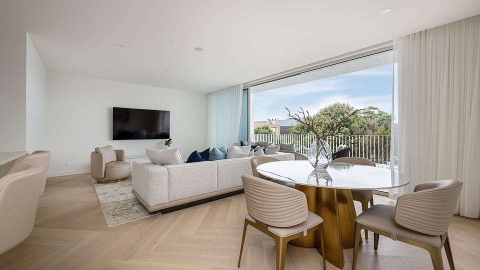 Lounge Opening to private balcony with water views 