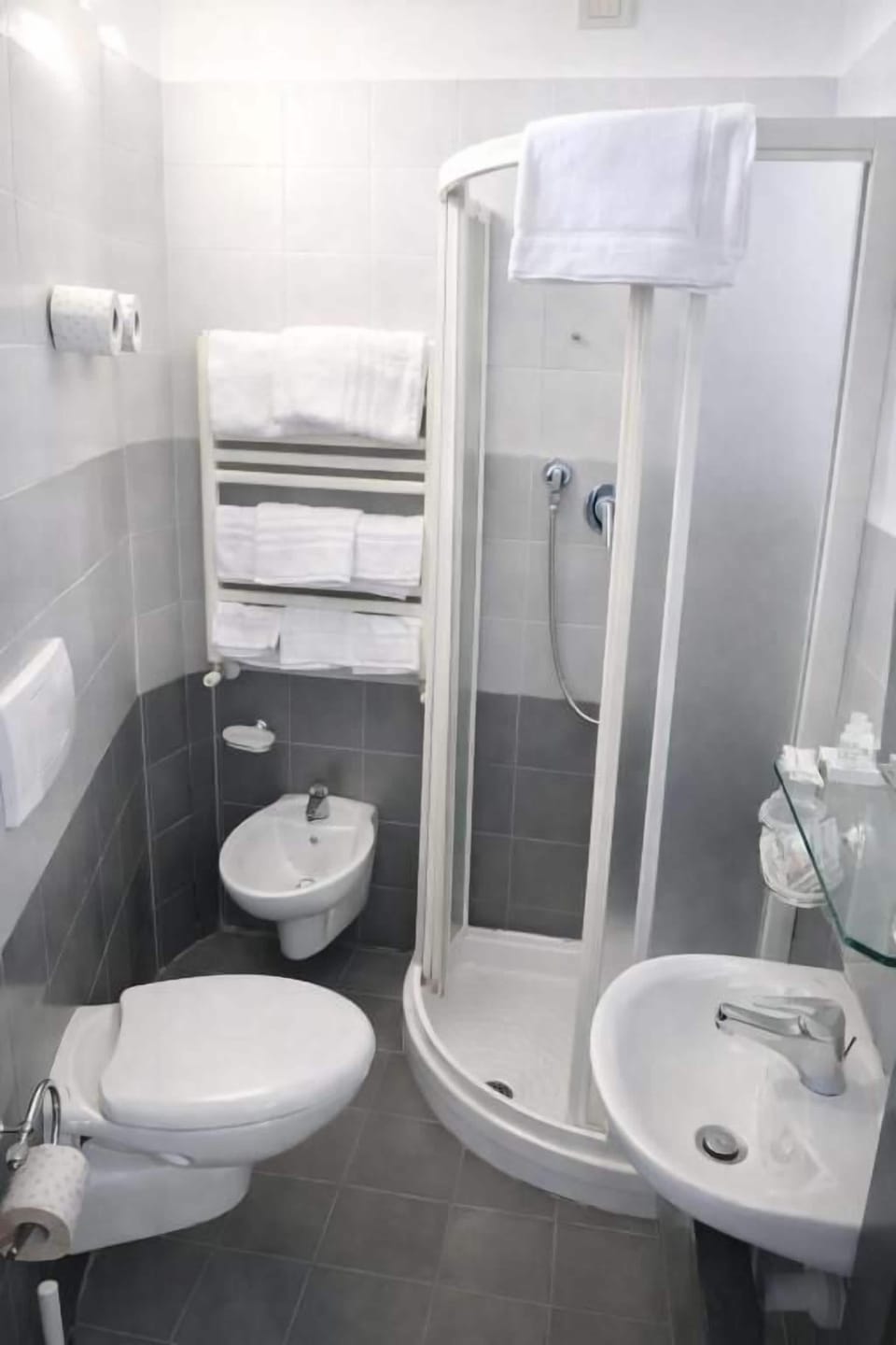 Hair dryer, towels, soap, shampoo