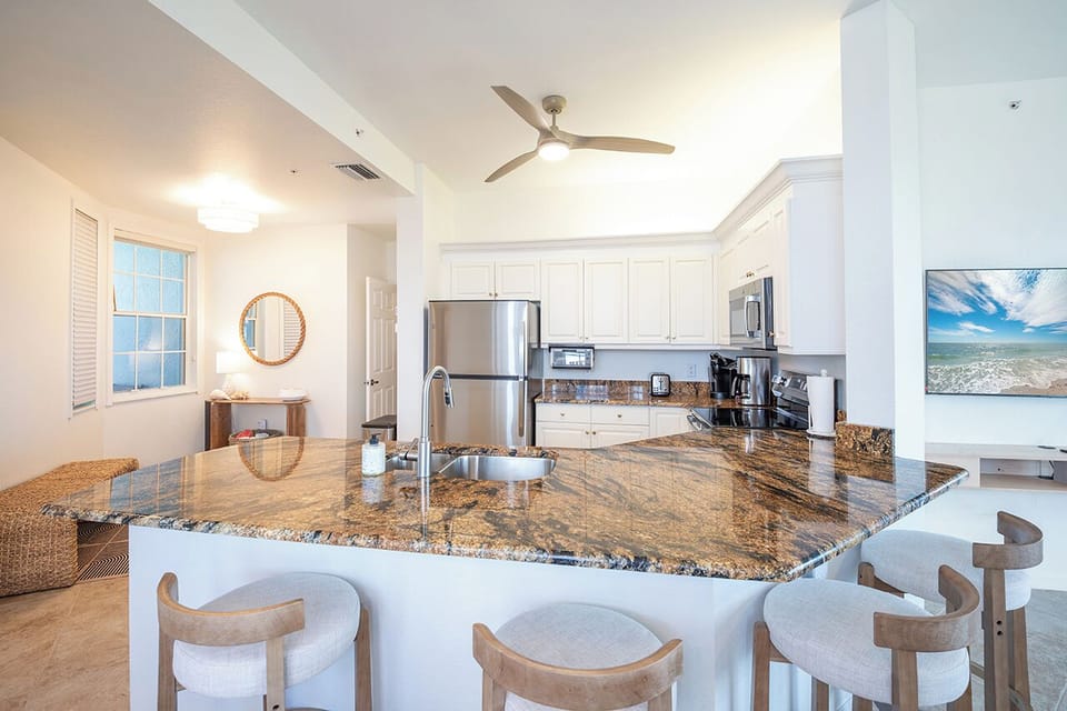 Newly Remodeled Kitchen includes a large Breakfast Bar for entertaining. 