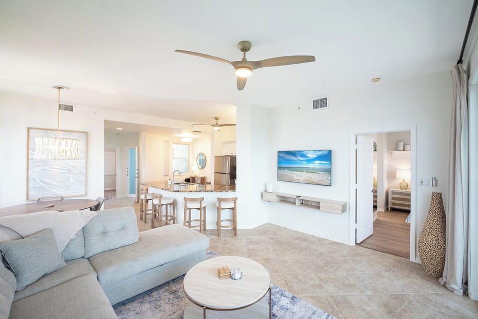 Comfy furnishings, large flat screen TV and open floor layout to accommodate the whole family