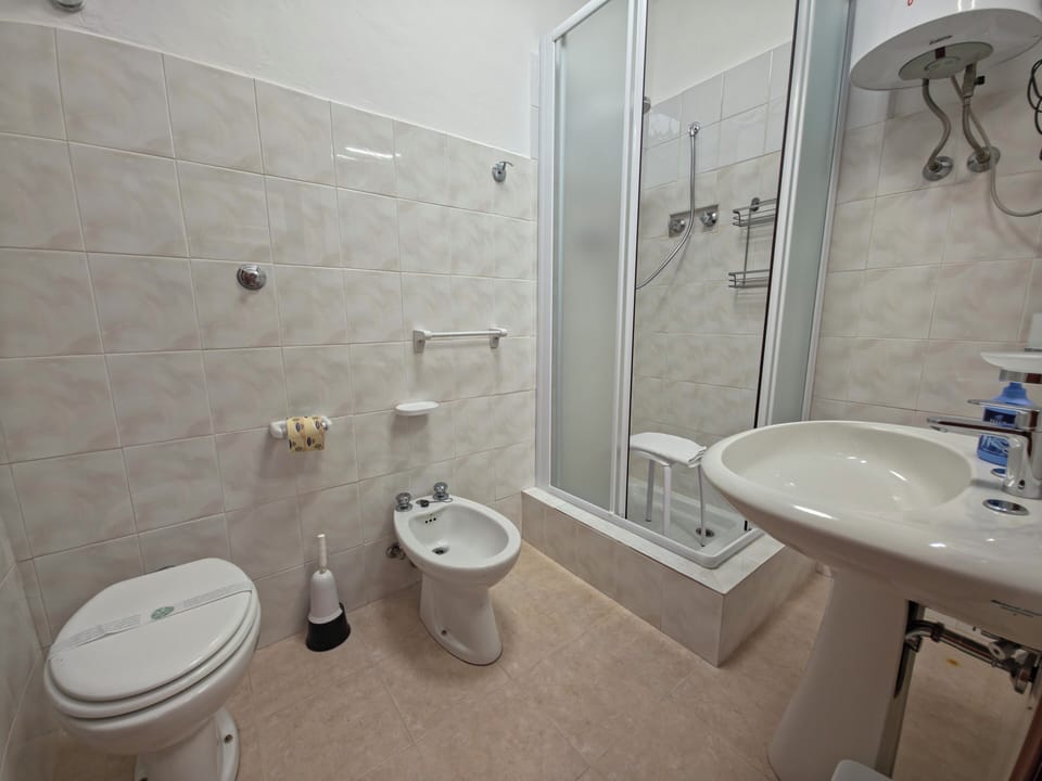 Standard Townhome, Non Smoking | Bathroom | Shower, hair dryer, towels, soap