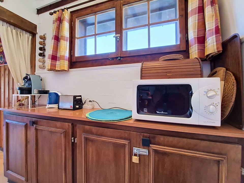 Wood, Interior Design, Kitchen Appliance, Furniture, Kitchen, Room, Cabinetry, Major Appliance, Wood Stain, Small Appliance