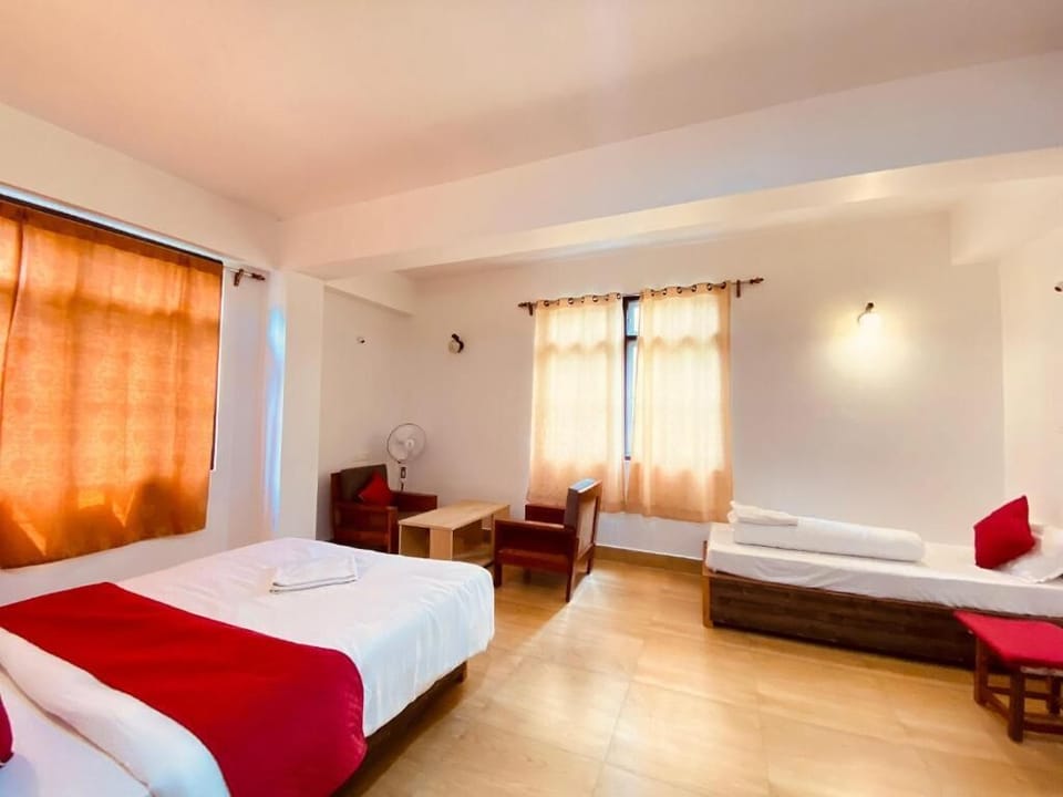 Deluxe Triple Room, City View | WiFi (free), bed sheets