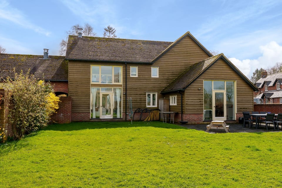Byre House, Sutton Waldron: The rear aspect of this generous family holiday let