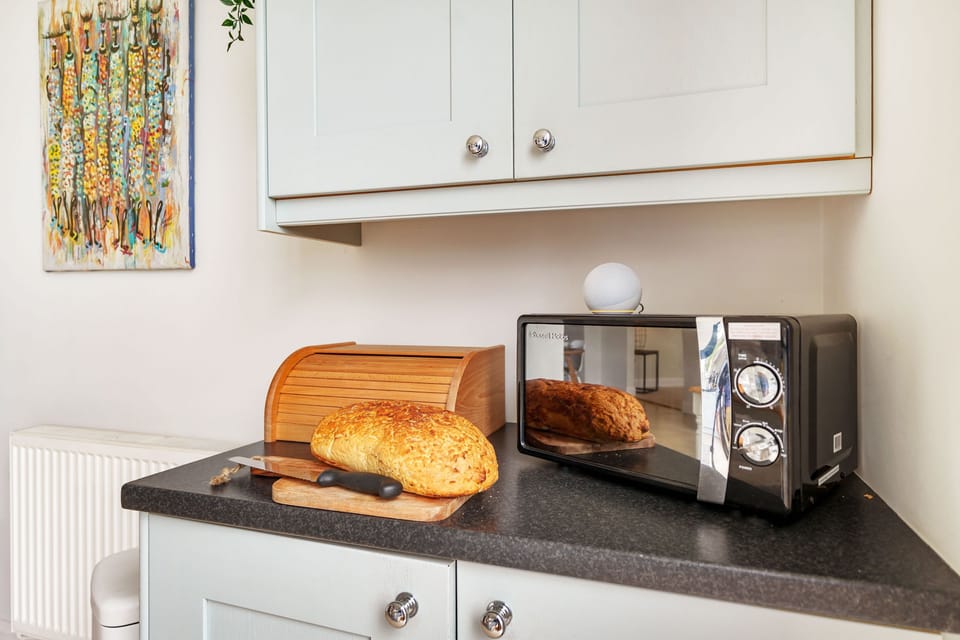 Byre House, Sutton Waldron, Shaftesbury: The kitchen includes a microwave