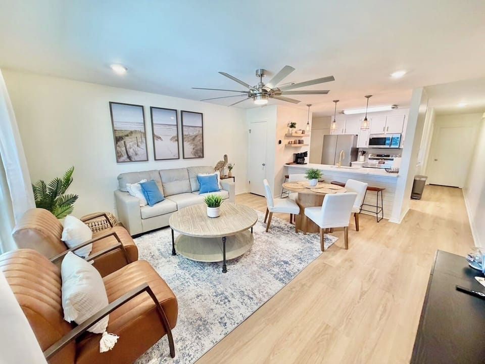 living room seating couch and two chairs 