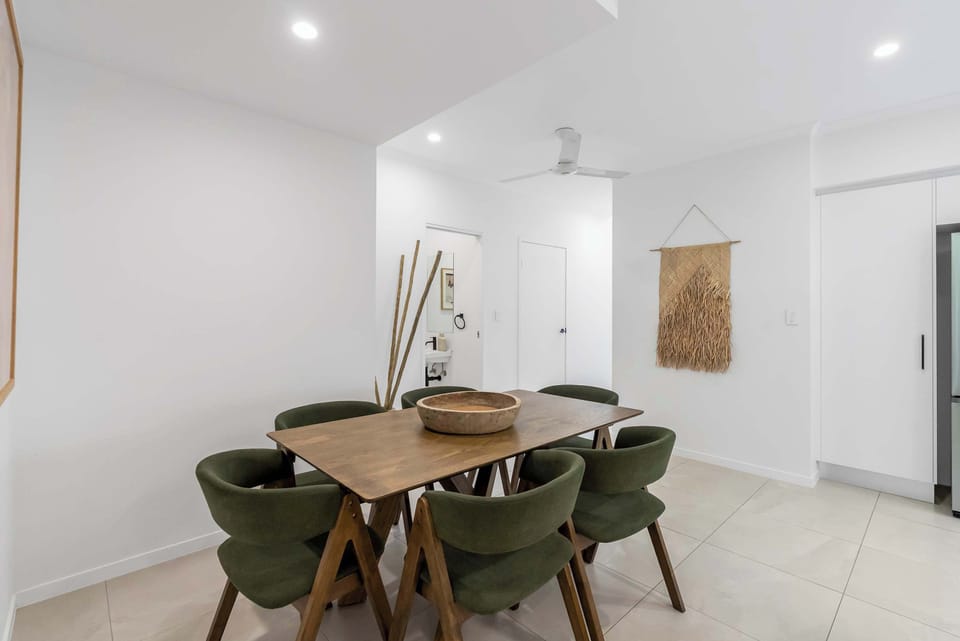 Enjoy memorable dinners in the dining room, where minimalist styling and generous space make every meal feel special.