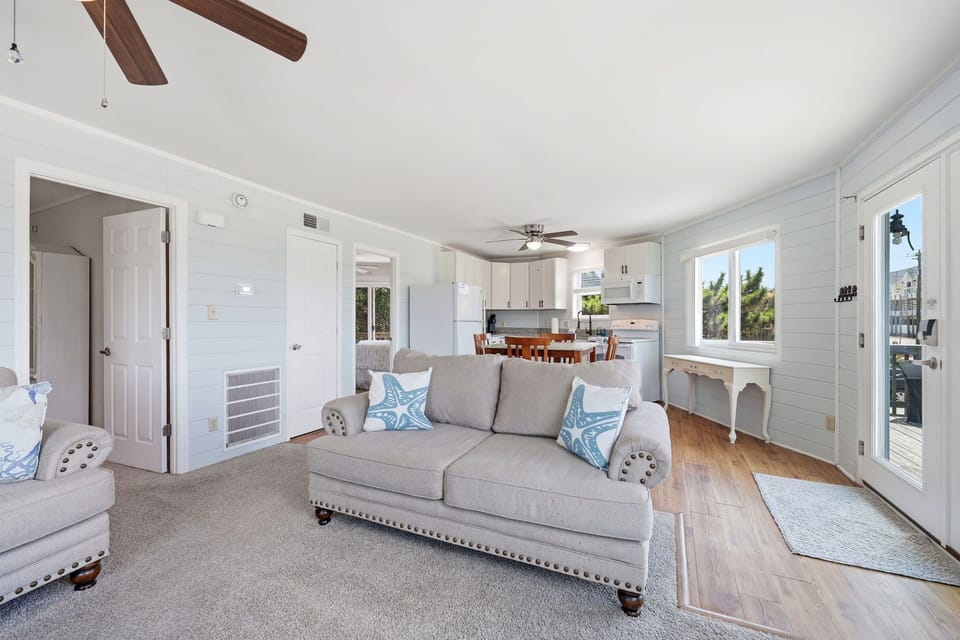 Comfortable seating just steps from the kitchen and deck