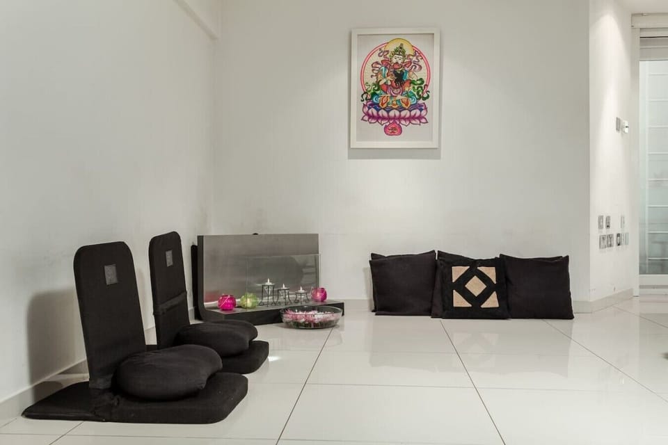 Living room with fire place and Japanese style sitting area