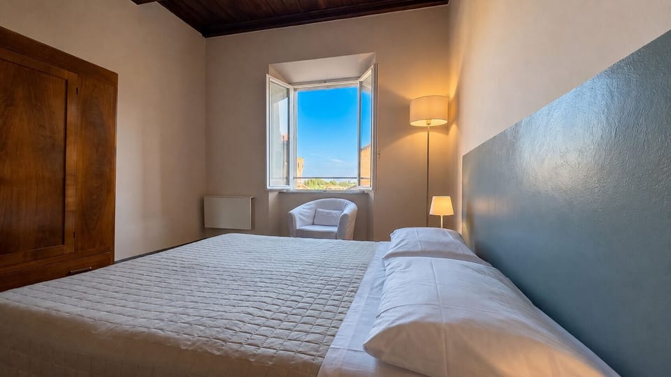 Superior Penthouse, City View | Desk, laptop workspace, soundproofing, iron/ironing board