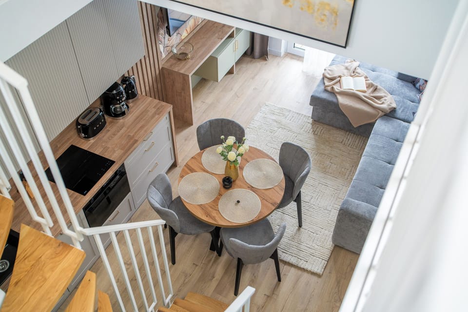 Premium Penthouse, 2 Bedrooms | Living area | 40-inch LED TV with cable channels