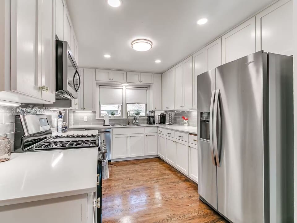 Bright modern kitchen with stainless appliances and ample counter space