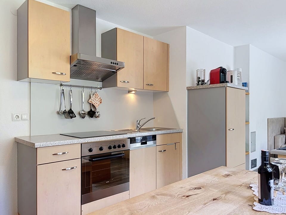 Kitchen, Kitchen Appliance, Countertop, Furniture, Cabinetry, Major Appliance, Wood, Flooring, Interior Design, Kitchen Stove