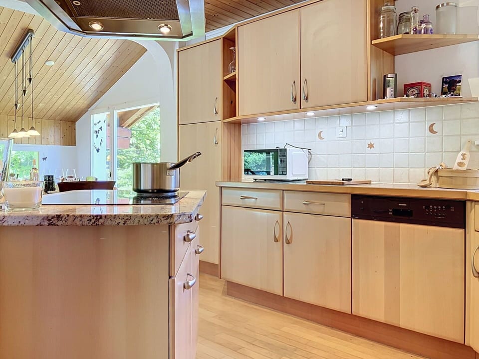 Countertop, Kitchen, Interior Design, Flooring, Kitchen Appliance, Wood, Furniture, Cabinetry, Floor, Ceiling