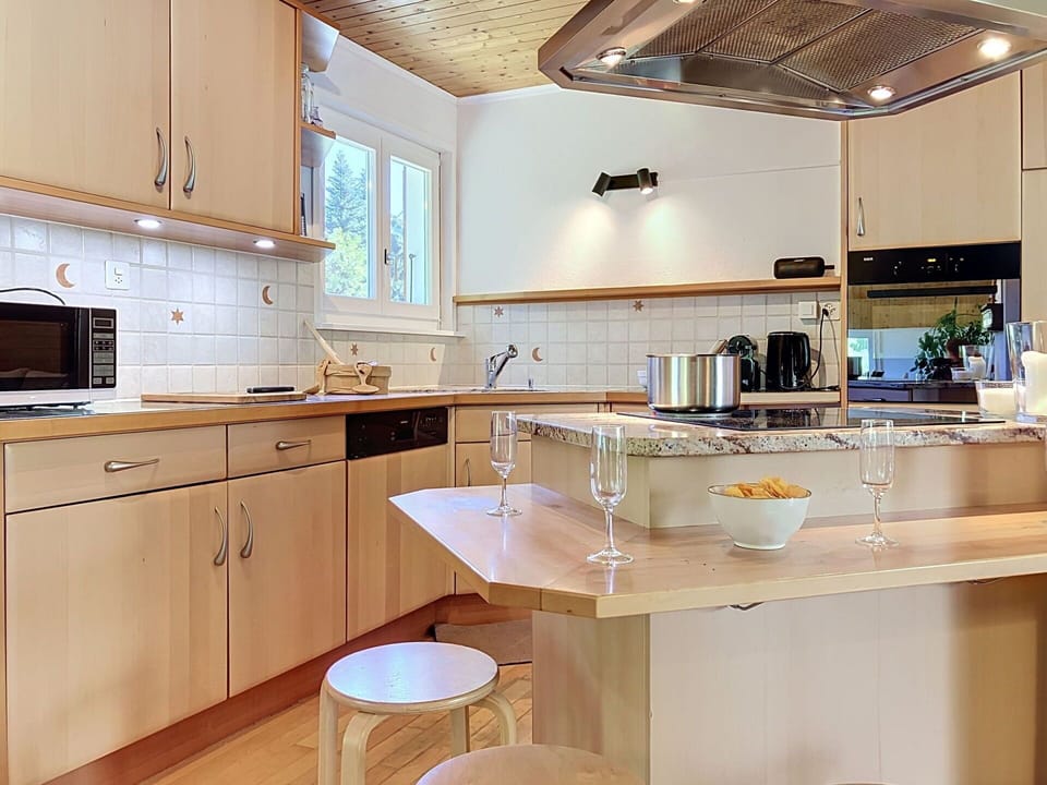 Kitchen, Countertop, Kitchen Appliance, Furniture, Cabinetry, Interior Design, Wood, Flooring, Light Fixture, Lighting