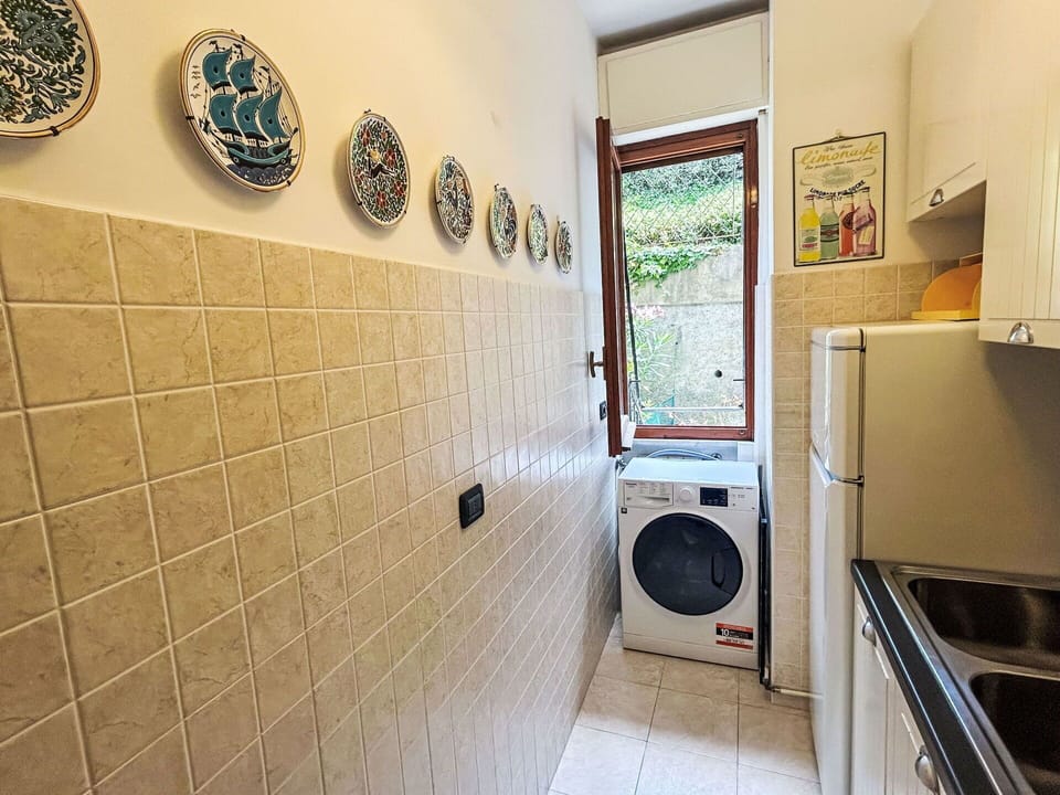 Washing Machine, Flooring, Major Appliance, Floor, Interior Design, Laundry Room, Clothes Dryer, Tile, Kitchen Appliance, Ceiling