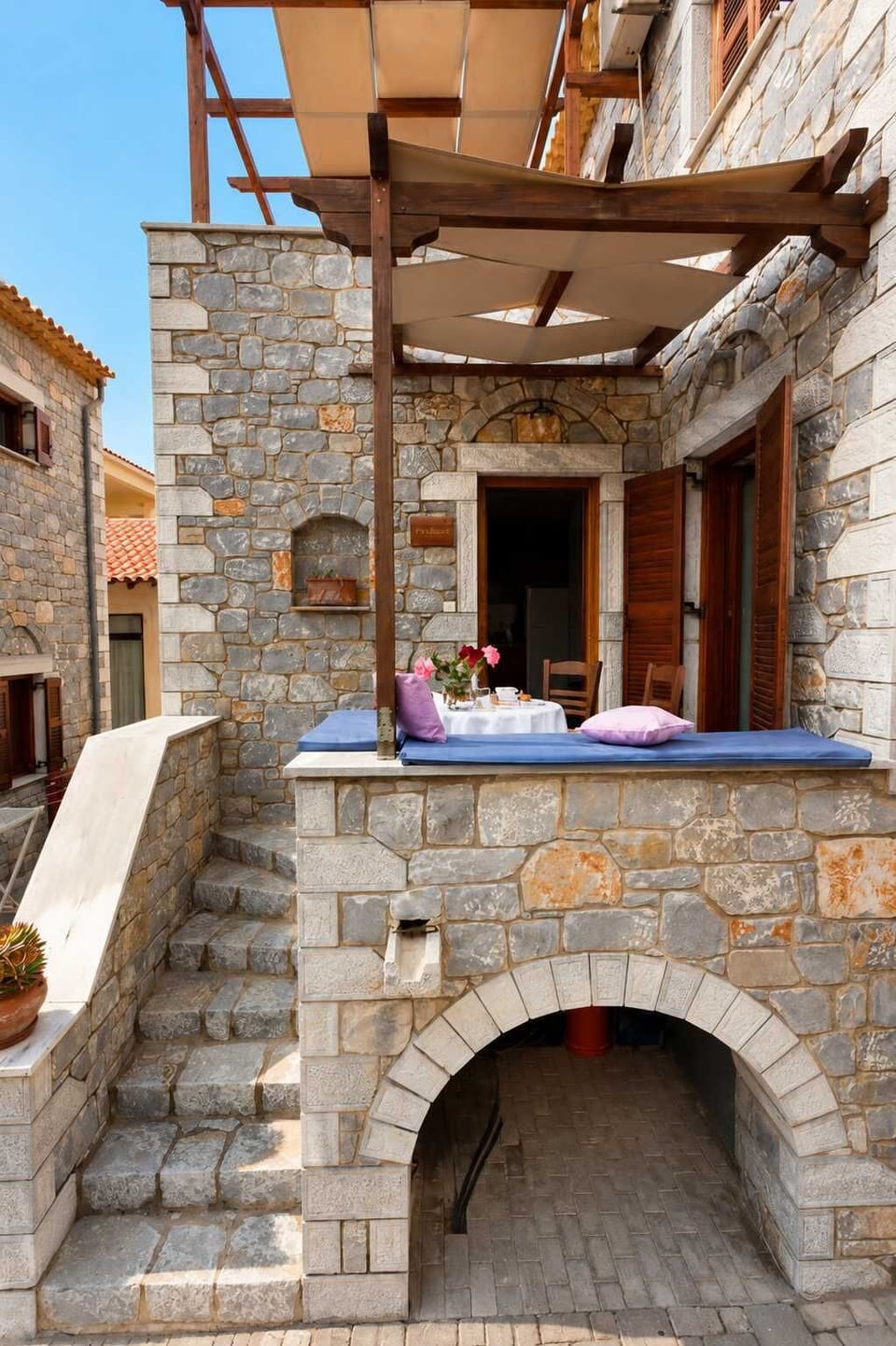 Traditional stone exterior area adding charm and authentic character to the home.