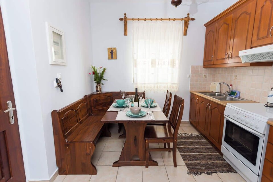 Traditional kitchen with a comfortable dining table for shared meals.
