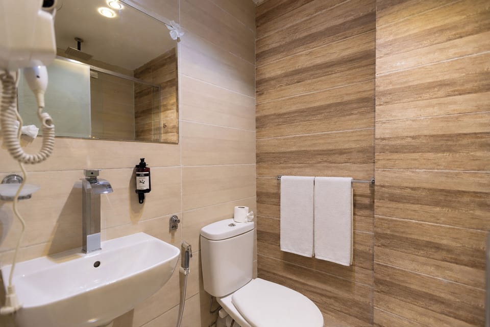 Superior Triple Room, Balcony, Mountain View | Bathroom | Shower, free toiletries, hair dryer, slippers