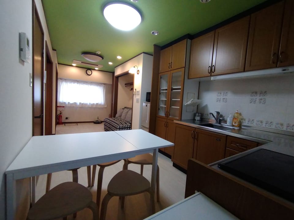 Comfort Apartment, City View | Private kitchen | Fridge, microwave, stovetop, dishwasher