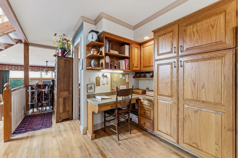 Dedicated work space located on the main floor in the kitchen area.
