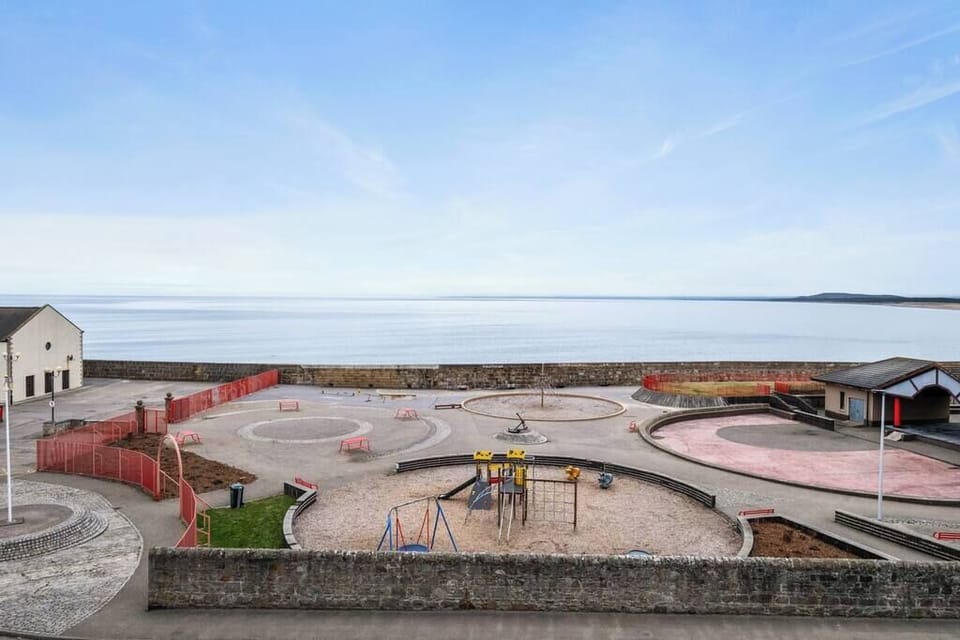 Balcony views, overlooking playground.