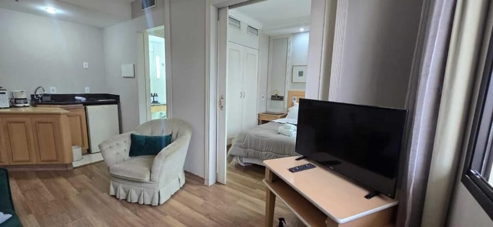 Classic Suite, City View | Living area | 32-inch LCD TV with digital channels