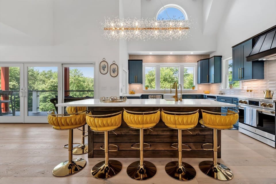 The spacious kitchen island keeps everyone together, whether you're preparing meals or enjoying a late-night snack.
