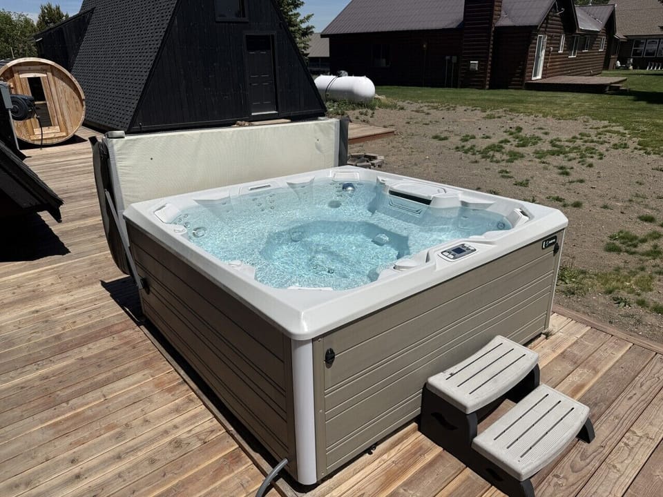 Relax in the hot tub on the back deck