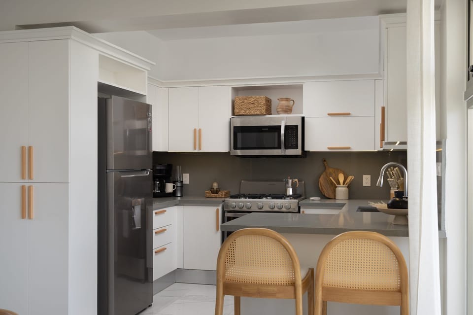 Full fridge, oven, microwave, coffee maker — what the rooftop grill can't handle