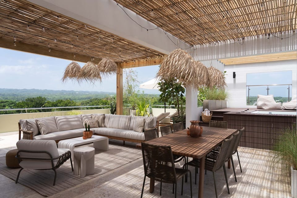 Al fresco dining with the coastline in the distance.