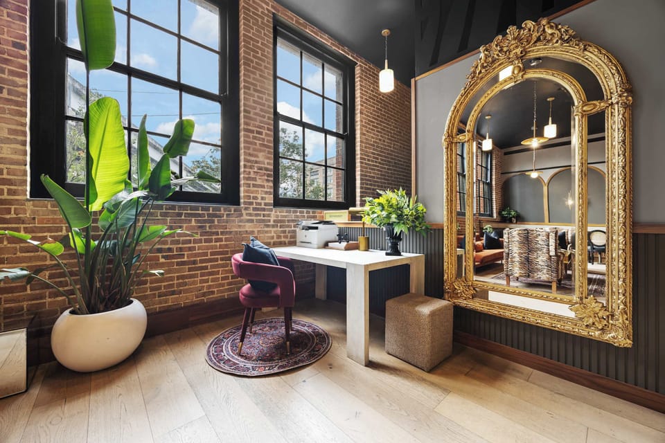A convenient guest workstation provides a comfortable place to catch up on emails or take care of travel details.